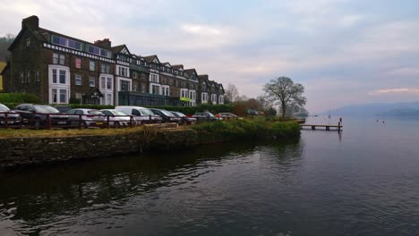 view of the cumbrian village of ambleside shot from the lake cruise ship on lake windermere