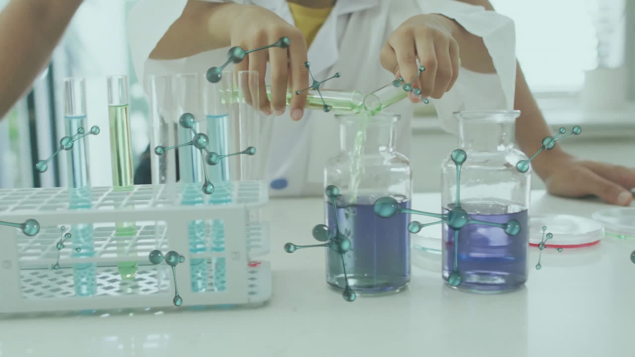 Animation of molecules over biracial boy working in lab