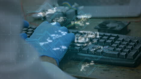 animación de iconos y procesamiento de datos sobre científico masculino usando el teclado de la computadora