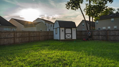 Timelapse-of-guy-mowing-the-backyard