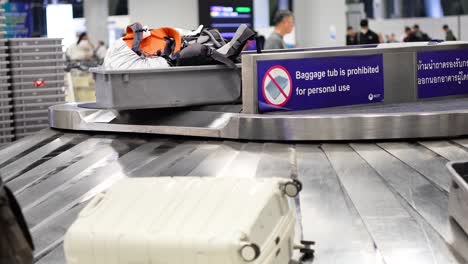 airport baggage carousel with prohibition sign