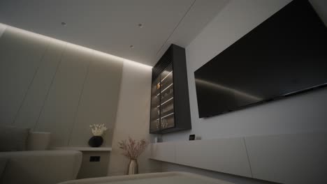 modern living room interior design and decoration with white sofa in living area, dining table and wooden chairs, kitchen counter and cabinets. 4k video 3d rendering apartment room with balcony