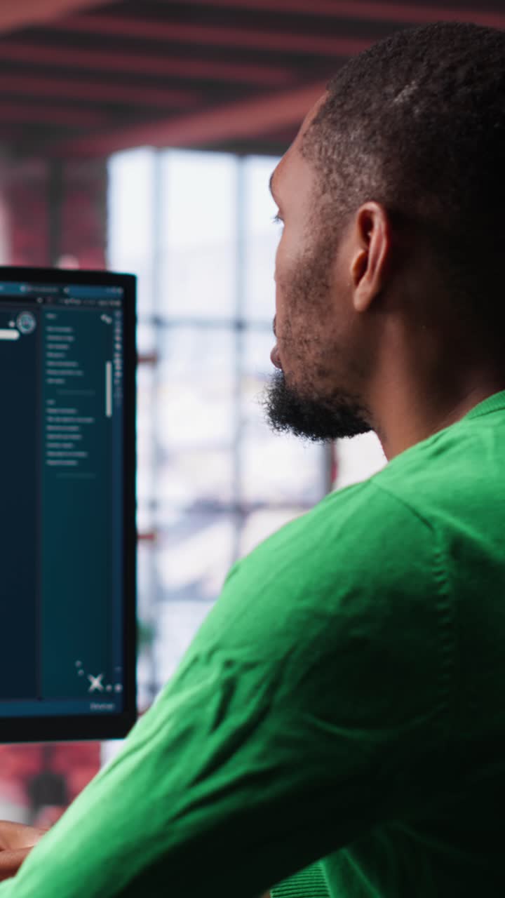 Vertical Video Black guy uses deep learning tools to generate video footage from text prompts