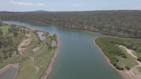 Tranquil-Waters-Of-Boyne-River-Near-Campgrounds-In-Rural-Town-of-Benaraby-In-QLD,-Australia