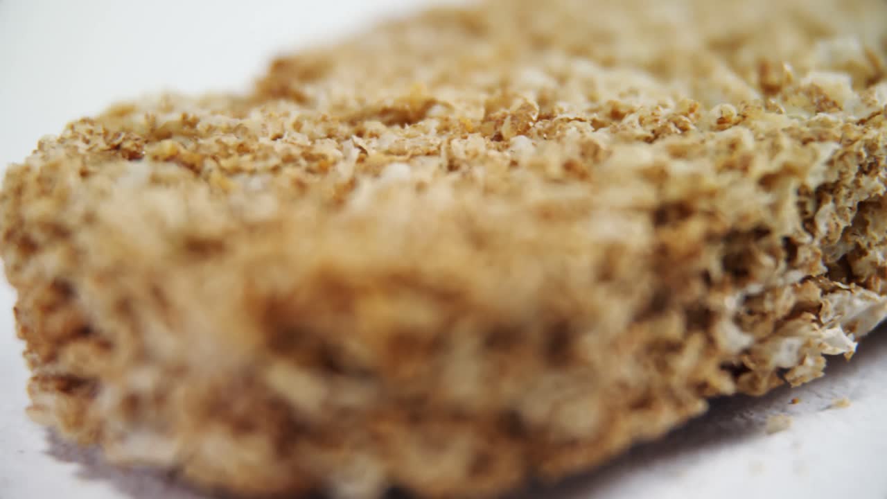 Granola bar on white background 4k