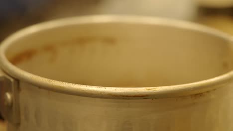 close-up of a metal pot rim