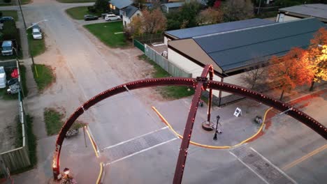 A-Steel-Beam-Drone-Shot-of-the-Northern-Canadian-Landscape-a-Small-Rural-Town-Skiing-Fishing-Village-Main-Street-Arches-in-Asessippi-Community-in-Binscarth-Russell-Manitoba-Canada