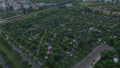 Aerial-view-of-block-of-community-gardens-in-urban-neighbourhood.-Piece-of-greenery-in-city.-Berlin,-Germany