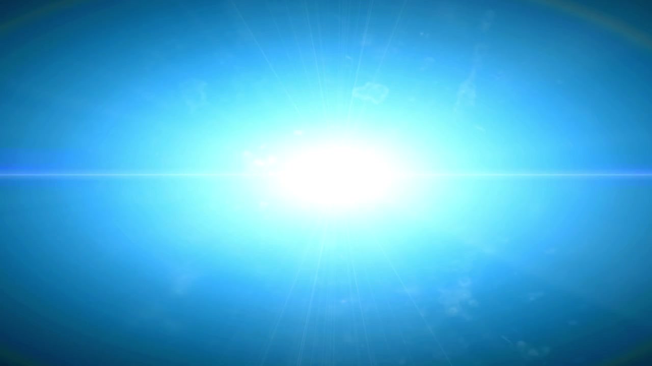 Dynamic Blue Lens Flare Bursting and Fading on Black Background