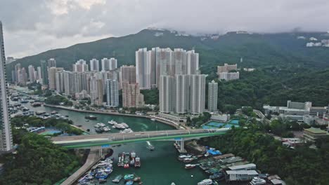 Aerial-drone-shot-of-the-bridge-in-Aberdeen,-Hong-Kong