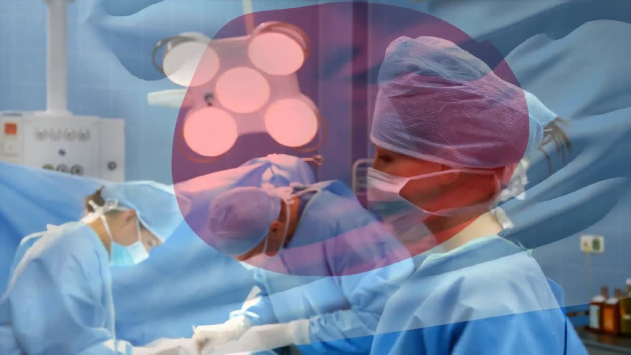 수술실 에서 외과 의사 들 위 에 흔들리는 일본 국기 의 애니메이션