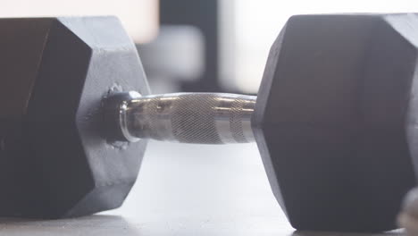 dumbbell gets put down dramatically after workout