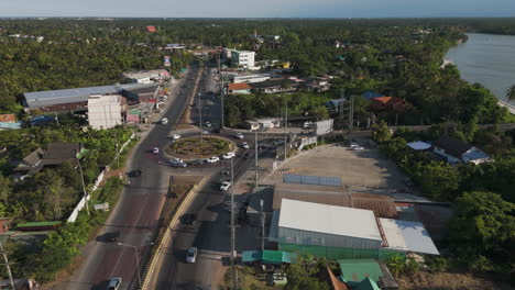 the roundabout road connected to the somdej phra sri suriyan bridge in ban prok, amphawa district, samut songkhram province, thailand.