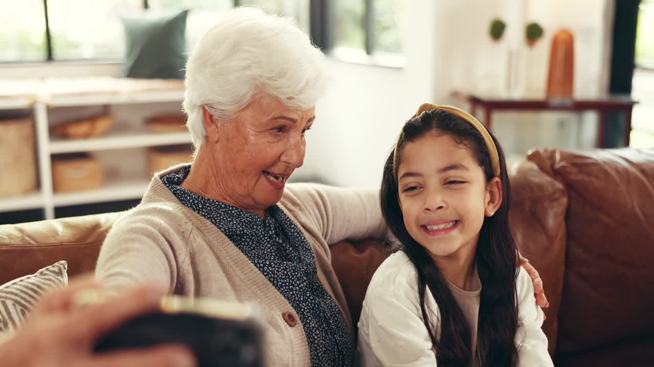 Grandmother and Granddaughter Taking a Selfie