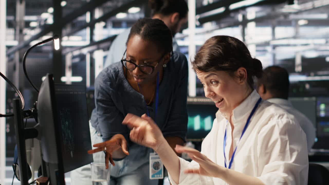 Vertical video Data center technicians adjusting blade server hardware powering AI