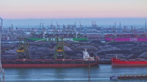 Aerial-hyperlapse-footage-of-industry-at-work,-Maasvlakte,-Netherlands