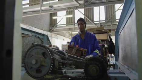 mixed race man working in factory