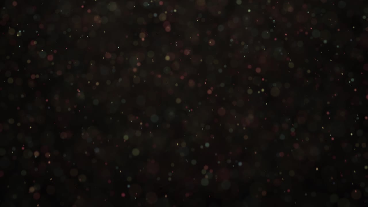 Colorful Bokeh Particles on Black Background