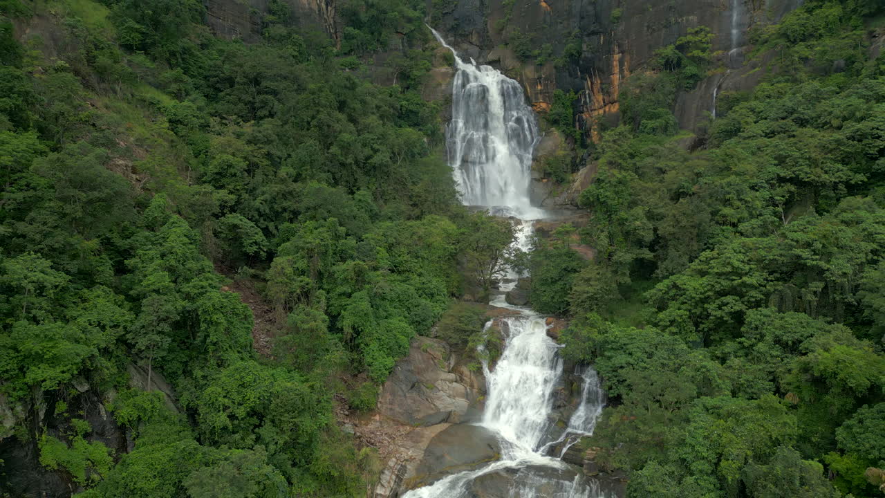 Pullback Establishing Aerial Drone Shot of Ravana Falls in Ella Sri Lanka