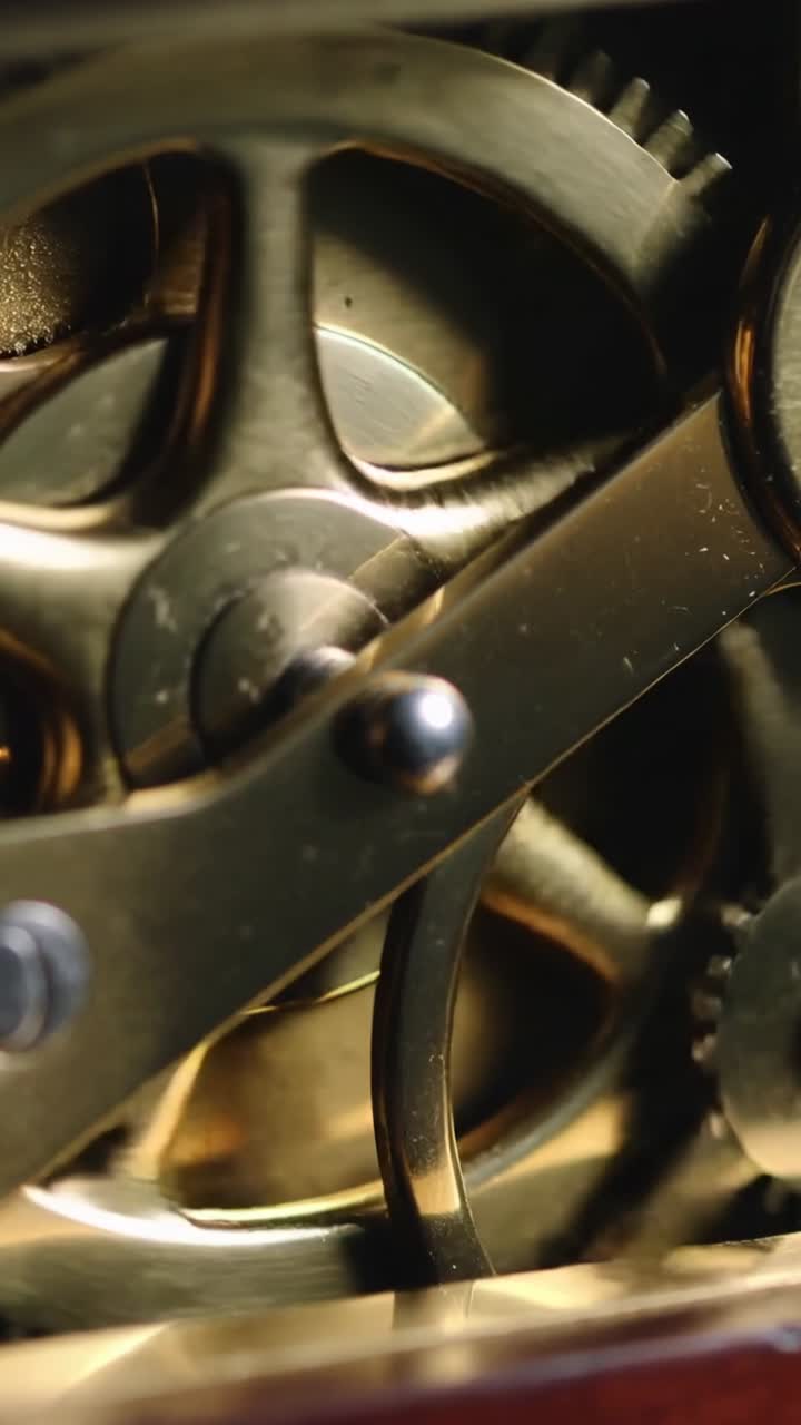 Vertical video: Powering escapement, escape wheel advancing and pallet rocking in mantel, timing