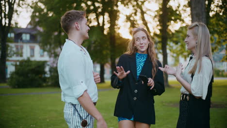 friends enjoying a conversation in a park