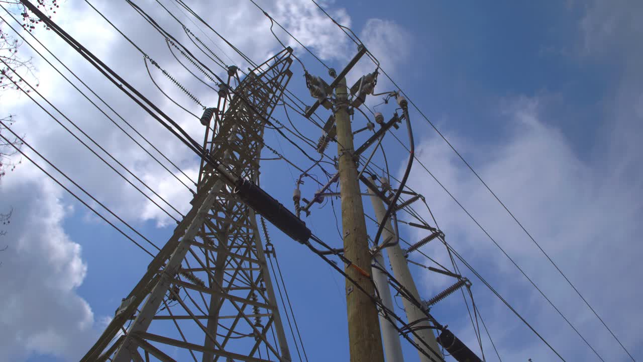 Fast-Moving Clouds Over Tall Electricity Utility Pole – 4K Timelapse