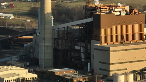 Golden-hour-aerial-shot-of-Flint-Creek-Power-Plant-by-Lake-Swepco,-Arkansas