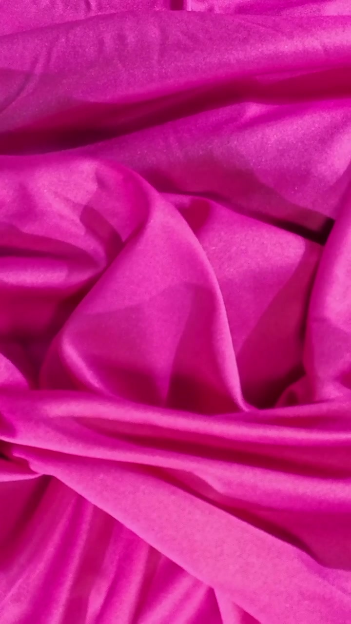 Texture di tessuto rosa stropicciato