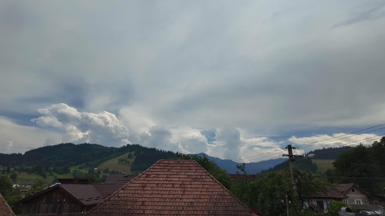Rarau mountains from distance time-lapse rural Campulung Moldovenesc Romania