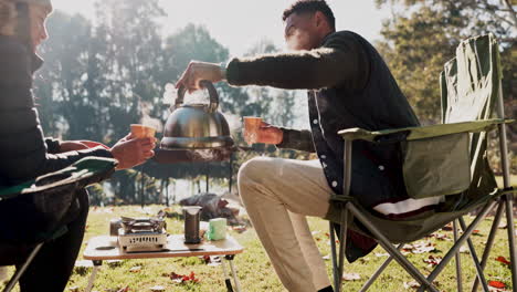 Couple,-camping-and-tent-with-pouring-coffee