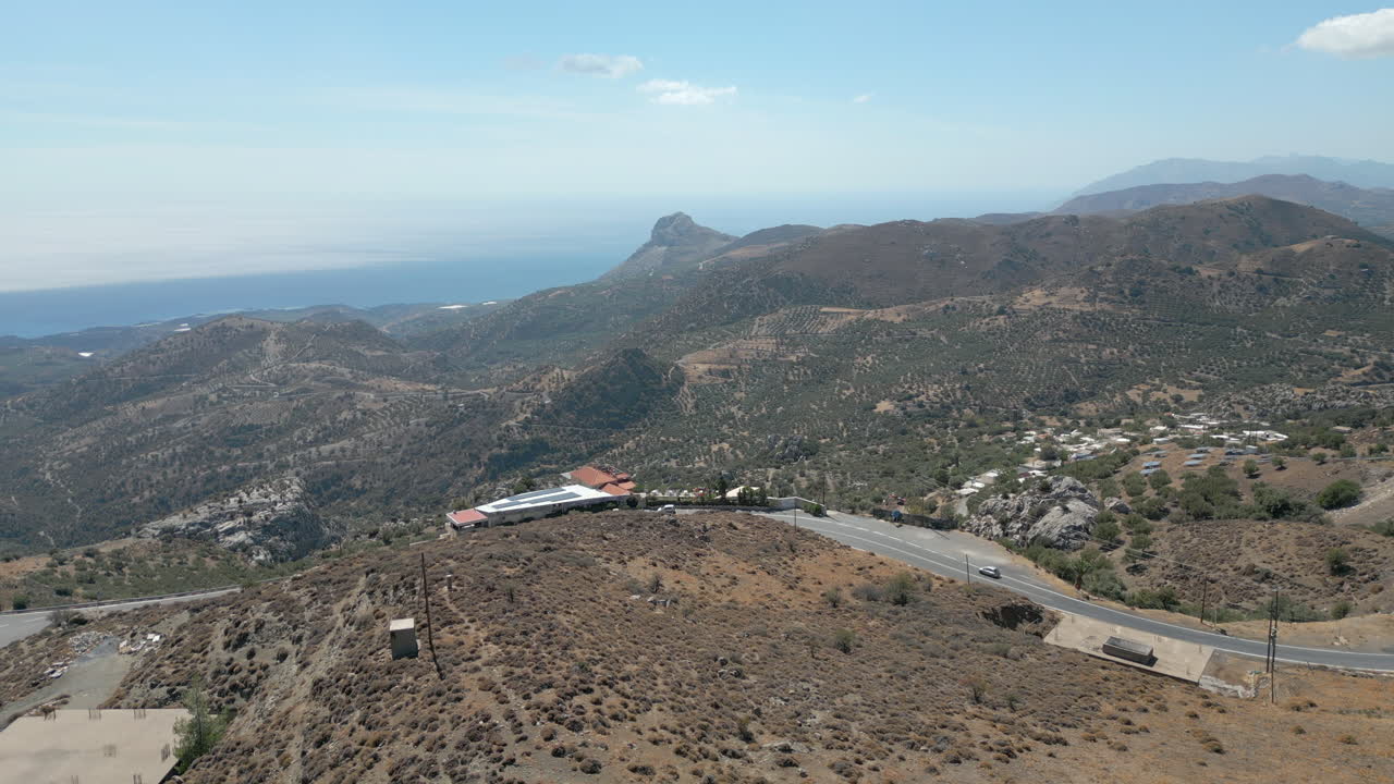 Isolated Greek Church With Epic Views Over Crete Coastline Drone Track Forward 4K 60FPS