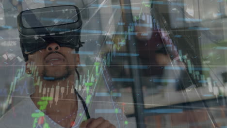 animation of financial data processing over biracial man wearing vr headset