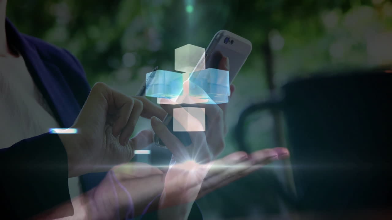Interacting with holographic animation cubes, hands using smartphone outdoors