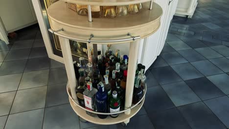 rotating view of spirits and cocktail bottles