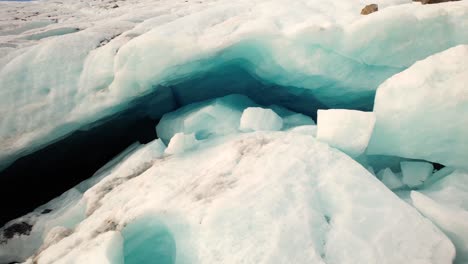 drone pull back from ice cave reveal of melting brewster glacier in new zealand