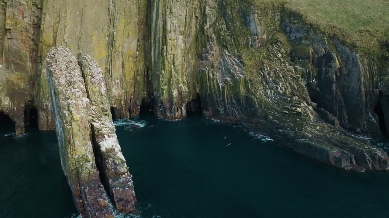 Drone shot of Old Head of Kinsale cliffs, County Cork, Ireland 12