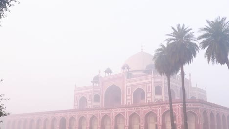 humayun tomb at misty morning from unique perspective shot is taken at delhi india