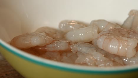 raw king prawns in bowl ready for cooking