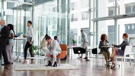 Businesspeople-walking-in-cafeteria