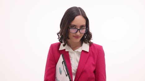 businesswoman in pink blazer with clipboard on white background