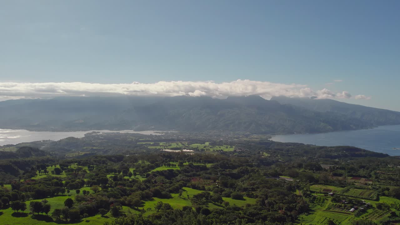 Slow Pan Left Aerial Drone Footage of Tahiti Island from Mountain Top