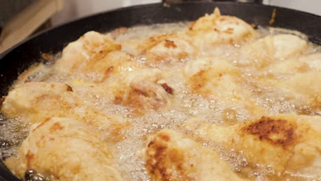 frying chicken drumsticks for dinner