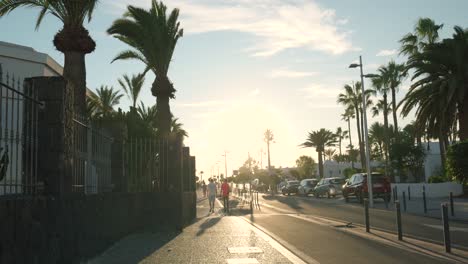 sunset walkway in a tropical resort town