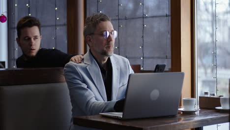 businessman working in a cafe