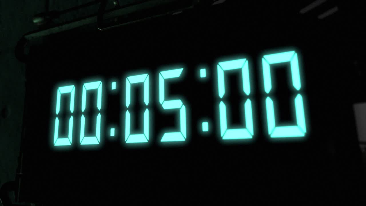 High quality CGI render of a digital countdown timer on a wall-mounted screen, with glowing pale blue numbers, counting down from 10 to zero, with dramatic right to left camera move
