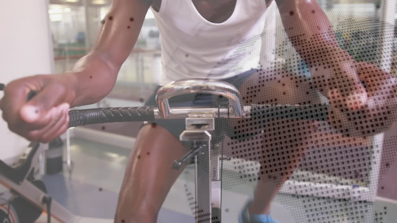 Man gripping handle and starting rowing, pulling for fitness as dotted overlay covering torso