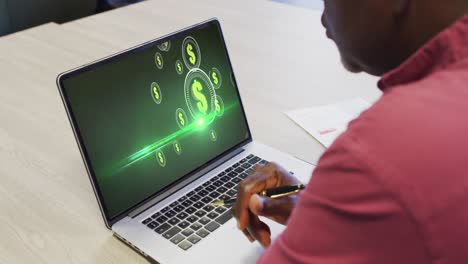 African-american-businessman-using-laptop-for-video-call-with-data-processing