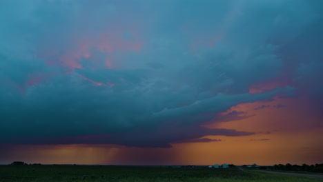 stormy sky is turned dreamy pastel colors by the setting sun