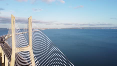 orbiting shot of vasco da gama bridge in lisbon revealing its true scale