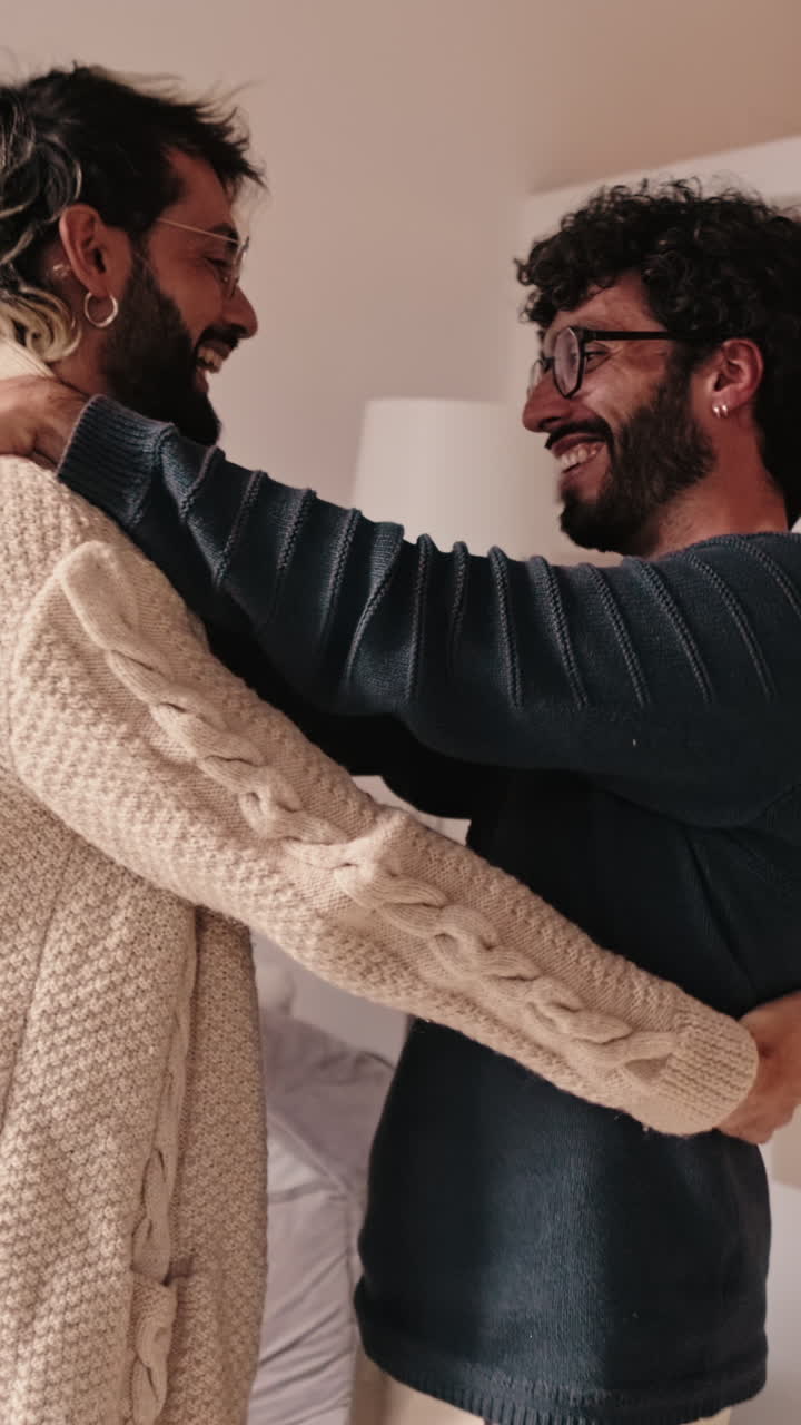 Gay Couple Dancing at Home Together